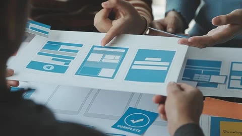 Close up ux developer and ui designer brainstorming about mobile app interf.. Stock Footage 236828093