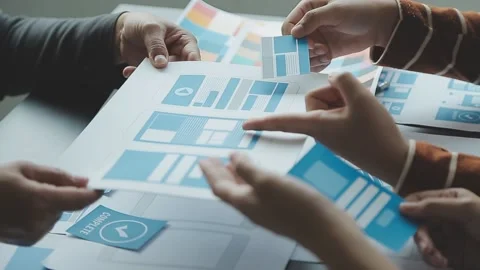 Close up ux developer and ui designer brainstorming about mobile app interf.. Stock Footage 236828095