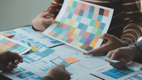 Close up ux developer and ui designer brainstorming about mobile app interf.. Stock Footage 236828096