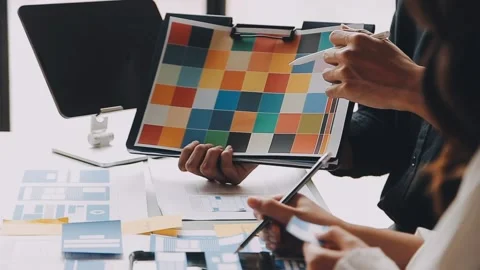 Close up ux developer and ui designer brainstorming about mobile app interf.. Stock Footage 236844558