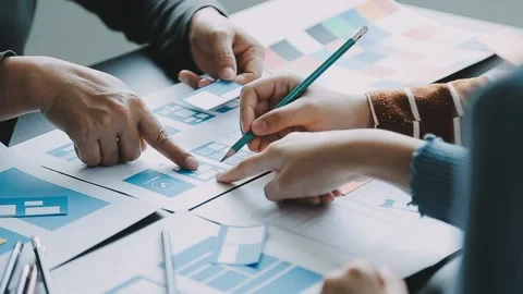 Close up ux developer and ui designer brainstorming about mobile app interf.. Stock Footage 236854162