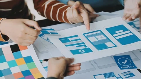 Close up ux developer and ui designer brainstorming about mobile app interf.. Stock Footage 236854186