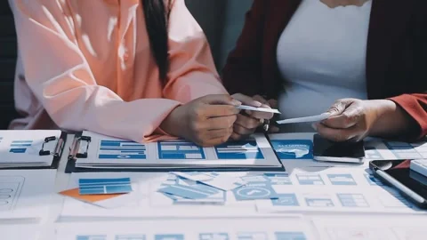 Close up ux developer and ui designer brainstorming about mobile app interf.. Stock Footage 293923239