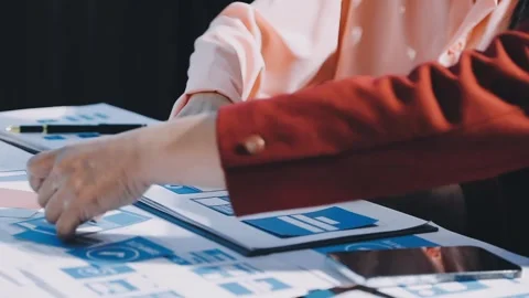 Close up ux developer and ui designer brainstorming about mobile app interf.. Stock Footage 293923257