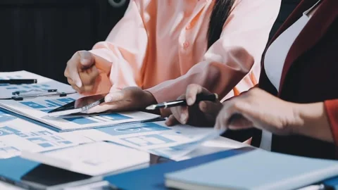 Close up ux developer and ui designer brainstorming about mobile app interf.. Stock Footage 293923267