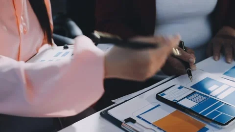 Close up ux developer and ui designer brainstorming about mobile app interf.. Stock Footage 293923306