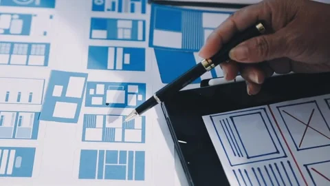Close up ux developer and ui designer brainstorming about mobile app interf.. Stock Footage 293923350