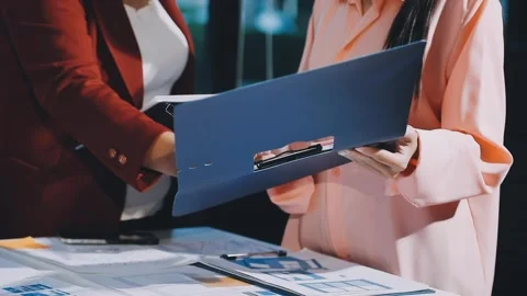 Close up ux developer and ui designer brainstorming about mobile app interf.. Stock Footage 293923390