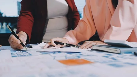 Close up ux developer and ui designer brainstorming about mobile app interf.. Stock Footage 293923421