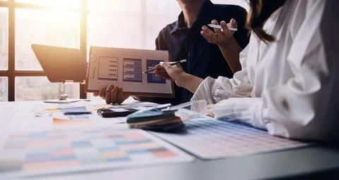 Close up ux developer and ui designer brainstorming about mobile app interf.. Stock Photos