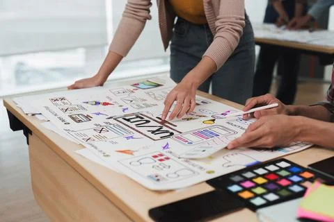 Close up ux developer and ui designer brainstorming interface wireframe design 스톡 사진