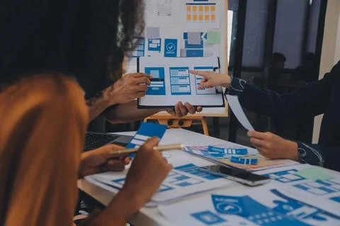 Close up ux developer and ui designer use augmented reality brainstorming a.. Stock Photos