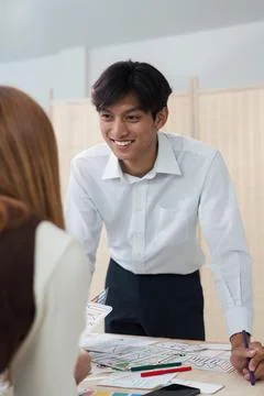 Close up ux developer and ui designer brainstorming interface wireframe design 스톡 사진