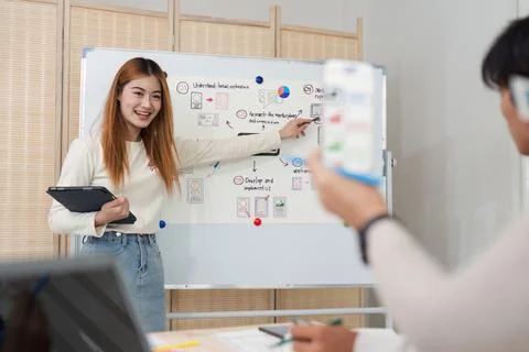 Close up ux developer and ui designer brainstorming interface wireframe design Foto stock