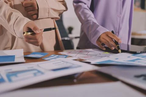 Close up ux developer and ui designer brainstorming about mobile app interf.. 스톡 사진