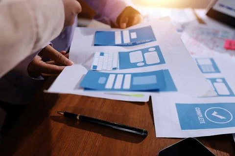 Close up ux developer and ui designer brainstorming about mobile app interf.. 스톡 사진