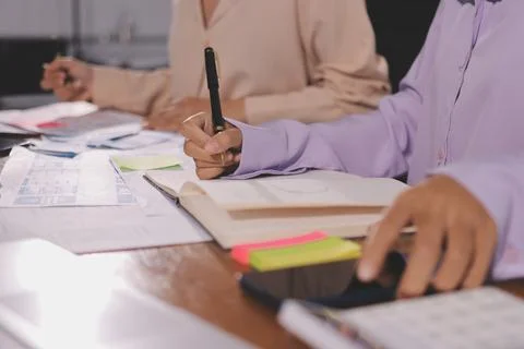 Close up ux developer and ui designer brainstorming about mobile app interf.. Foto stock