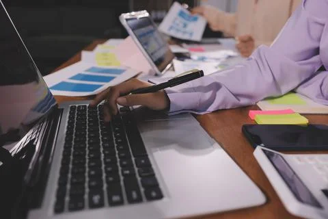 Close up ux developer and ui designer brainstorming about mobile app interf.. Foto stock