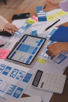 Close up ux developer and ui designer brainstorming about mobile app interf.. 写真素材