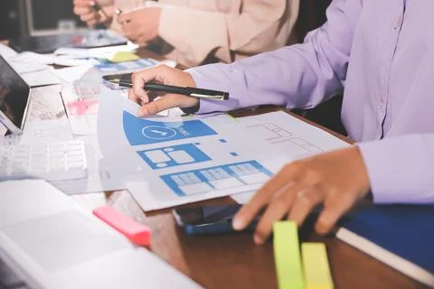 Close up ux developer and ui designer brainstorming about mobile app interf.. 스톡 사진