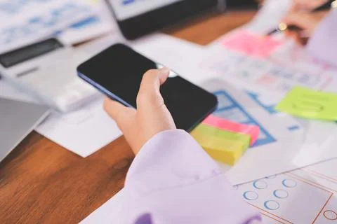 Close up ux developer and ui designer brainstorming about mobile app interf.. 스톡 사진