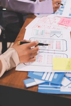 Close up ux developer and ui designer brainstorming about mobile app interf.. 스톡 사진