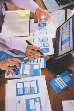 Close up ux developer and ui designer brainstorming about mobile app interf.. 스톡 사진