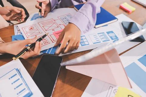 Close up ux developer and ui designer brainstorming about mobile app interf.. 스톡 사진