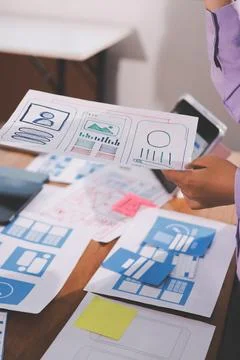 Close up ux developer and ui designer brainstorming about mobile app interf.. 스톡 사진