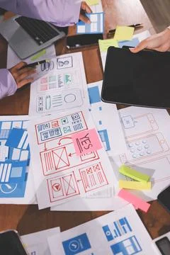 Close up ux developer and ui designer brainstorming about mobile app interf.. 스톡 사진