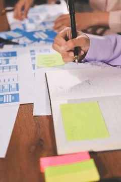 Close up ux developer and ui designer brainstorming about mobile app interf.. 스톡 사진