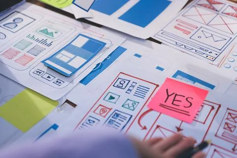 Close up ux developer and ui designer brainstorming about mobile app interf.. 스톡 사진