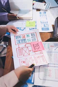 Close up ux developer and ui designer brainstorming about mobile app interf.. 스톡 사진