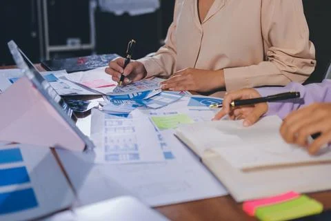 Close up ux developer and ui designer brainstorming about mobile app interf.. Stock Photos
