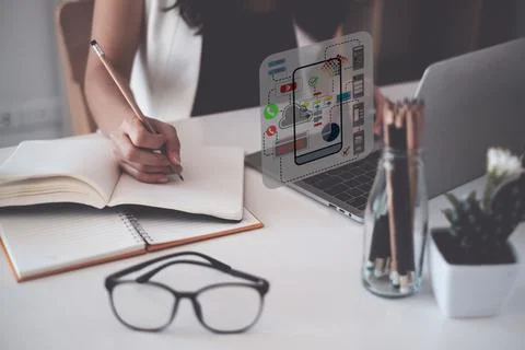 A close-up of an ux ui developer and an ui designer working on a mockup icon Foto stock