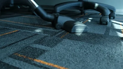 Close-up vacuum cleaner cleans the carpet 動画素材 194427030