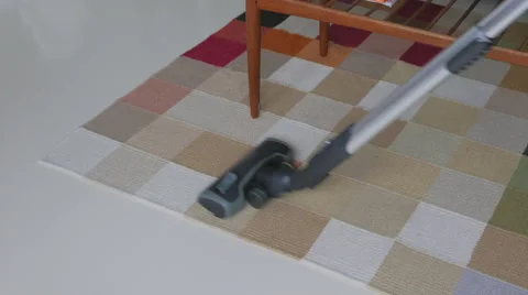 Close-Up vacuum cleaner on rug Video stock 51436635