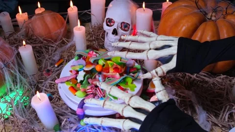 Close-up vampire hands rejoice pile colorful candies jelly sweet rotate Vídeo Stock 251134739