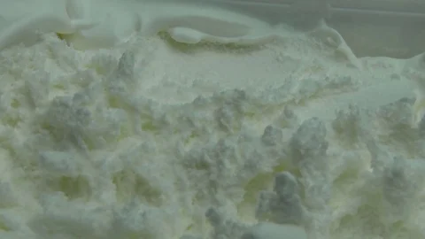 Close up of vanile ice cream being scooped 스톡 동영상 78339407