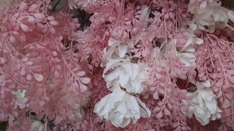 Close-Up of Various Colored Plastic Flower Decorations Video stock 291907852