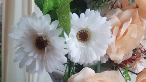 Close-Up of Various Colored Plastic Flower Decorations Stock Footage 291907898