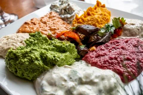 Close-up of various colorful Middle Eastern dips and spreads Stock-Fotos