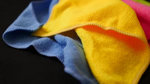 Close-up of various colors of microfiber cleaning cloths, colorful cleaning c Vídeos de archivo 201377062