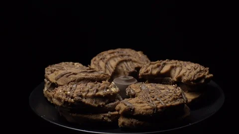Close-up of various cookies in rotation. Black background. Stock Footage 101406962