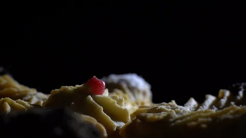 Close-up of various cookies in rotation. Black background. Stock Footage 101408148