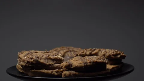 Close-up of various cookies in rotation. grey background. Stock Footage 101406756