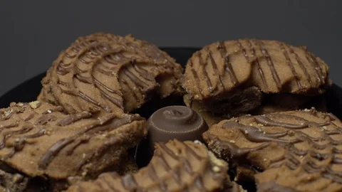 Close-up of various cookies in rotation. grey background. Stock Footage 101406771