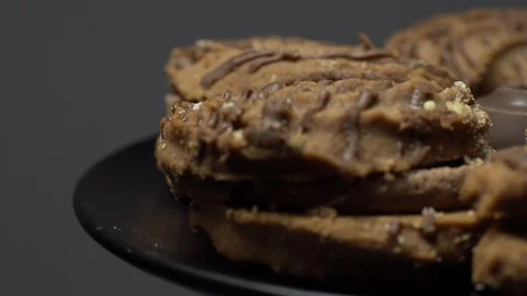 Close-up of various cookies in rotation. grey background. Stock Footage 101407082