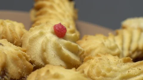 Close-up of various cookies in rotation. grey background. Stock Footage 101407605