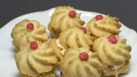 Close-up of various cookies in rotation. grey background. Stock Footage 101408579